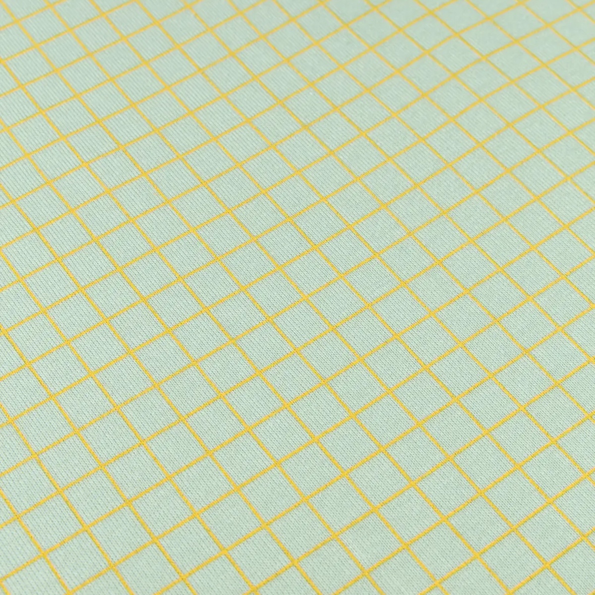 Babybettlaken aus Bio-Baumwolljersey STORIES Limitierte Auflage 70x140cm Nobodinoz grün Zitrone Gitter