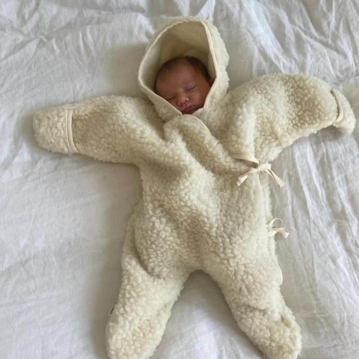 Kuscheliger Jumpsuit aus Merinowolle 0-6M Binibamba milk