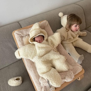 Kuscheliger Jumpsuit aus Merinowolle 0-6M Binibamba milk