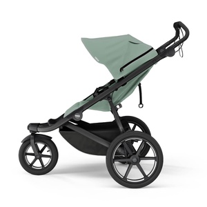 Poussette Urban Glide 3 Thule Mist Green magnetic buckle
