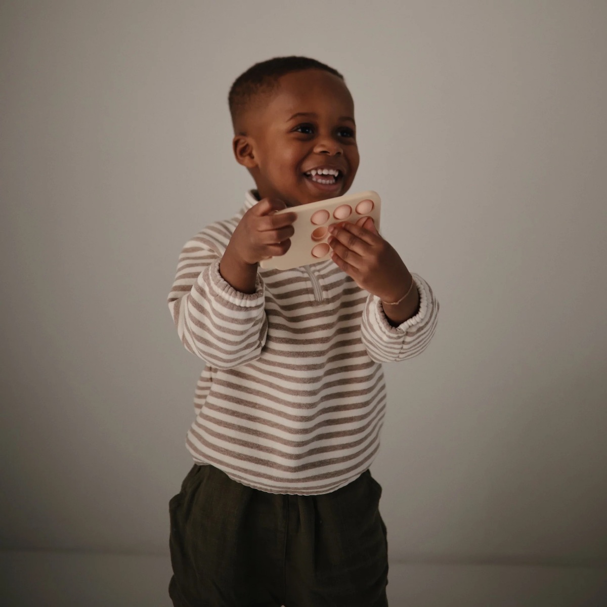 Presse Spielzeug Telefon Mushie Blush     