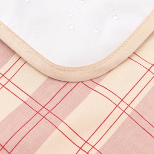 Tapis à langer STORIES Édition limitée 45x65cm Nobodinoz powder red checks