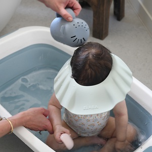 Visera baño silicona Beaba grau